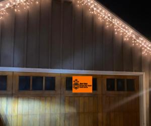 echnician installing oil-tempered torsion springs on a garage door in Canyon Country 91387, part of the Next Hour Garage Door Repair mobile fleet serving Santa Clarita.