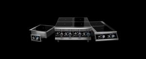 A lineup of professional induction ranges against a black background.