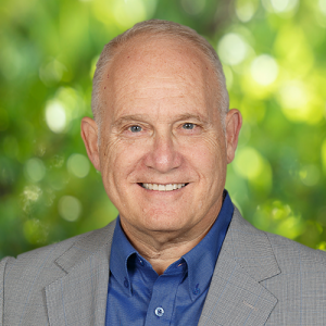 Philip J. Whitman, CEO & President