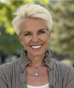 Portrait of Kathy Andersen in a natural setting, creator of Transcend Pulse.