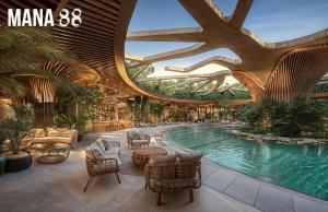 Área de alberca y amenidades en Mana 88, desarrollo residencial en la Riviera Maya con diseño contemporáneo y entorno natural.