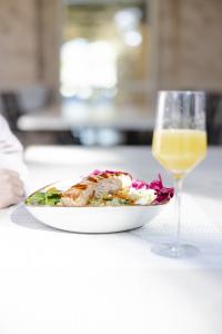 The Trellis Spa Dining Menu features seasonal and fresh seafood, salads, charcutrie and more, in a relaxed setting overlooking the property's wooded meadow.