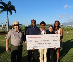 (Left to right) Tom Leatherman, Clinton Johnson, Harrison Johnson, Aileen Utterdyke and Cheznee Johnson with the $110,000 tribute check to Pacific Historic Parks.