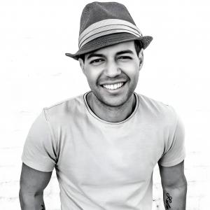 Headshot of Robbie Cabral, inventor and CEO of BenjiLock, Shark Tank entrepreneur and TIME Best Inventions 2025 honoree, appearing at The NAMM Show 2026.