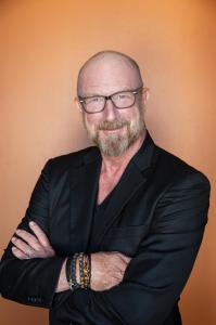 photo of CEO Dain Ehring:  QGI is building neurosymbolic quantum general intelligence for decisions that actually matter.