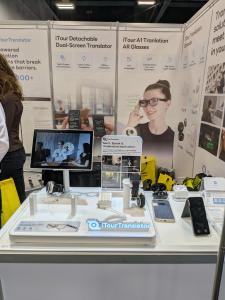 iTour Translator booth at CES 2026 showcasing AI-powered translation solutions. Photo by Brian Sebastian/Movie Reviews and More.