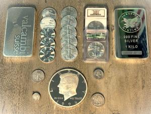 At The Jewelers Coin & Loan Co., we’re buying silver coins of every kind at our exclusive silver buying event. Whether you have vintage or modern pieces, bring them in for a free evaluation and a competitive offer. The photo showcases a diverse array of silver coins.