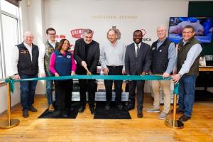 Charcuterie Artisans executives and local elected officials pose as the ribbon is cut to open the Innovation Center. L to R: Jeff “Trip” Tripician, CEO of Charcuterie Artisans, Michael Burgess, Marketing Director for Charcuterie Artisans, Lt. Governor Sab