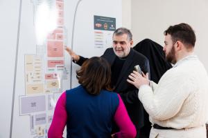 Largest Charcuterie Manufacturer in the U.S., Charcuterie Artisans, Opens Innovation Center, Expands Capacity 22 Cristiano Creminelli shows guests a map of the 561,444-square-foot production facility and campus in Mapleville, RI