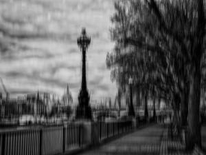 South Bank Walk – Black and white abstract ICM photograph of a riverside lamppost and trees blurred through motion, exploring contrast, rhythm, and urban memory.