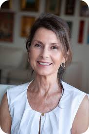 Portrait of historical fiction author Myriana Merkovic, photographed indoors in natural light.