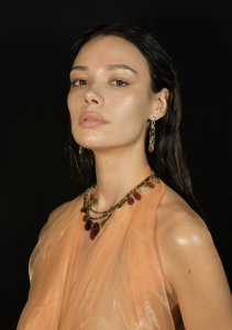 Model with Jewelry and Inspo Wardrobe. Wet Hair, dewy skin.