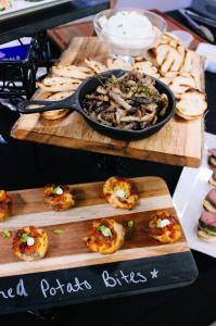 Chef Serge Krikorian's sautéed mushroom crostini with whipped ricotta (top) and twice-baked potato bites (bottom), two of four winter appetizers demonstrated on THV11's The Vine. Photo by Vibrant Occasions Catering.