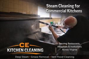 Technician Performing High-Temperature Steam Cleaning in a Commercial Kitchen