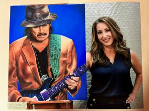 Amber Rinehart artist with Carlos Santana Portrait Hand Painted