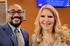 Abdul Tubman standing with Natanya Wachtel.