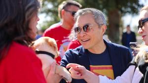 DC Executive in Superman Shirt Meets His Yellow Labrador Puppy Lobo