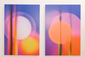 A collection of artworks by Ákos Burg displayed during his exclusive token release event in Vienna, held in partnership with GAIA Culture. The image captures the intersection of fine art and the tokenization of an artist's brand equity to unlock new finan