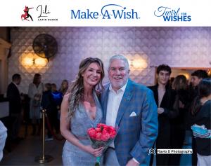 man and woman posing for picture