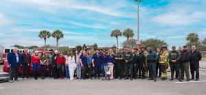 Group photo of community partners, first responders, and organizers participating in the Together 4 Safety Community Crash Reenactment at Palm Beach State College.
