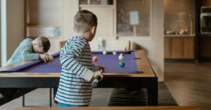 Children playing pool tables at Fair Oaks Farms.