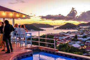 Rooftop terrace and pool overlooking Charlotte Amalie Harbor at a boutique hotel in St. Thomas