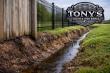 Tony’s Fencing & Iron Works Highlights Impact of Drainage on Fence Stability in St. Tammany Parish