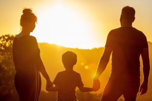 A smiling family outdoors, representing the personalized, relationship-focused healthcare families receive at Mosaic Medicine Clinic’s Direct Primary Care practice in Bradenton.