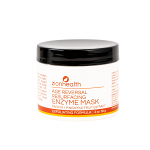 Zion Health Age Reversal Resurfacing Enzyme Mask in a white jar with black lid, formulated with papaya and pineapple enzymes for gentle exfoliation and skin renewal.