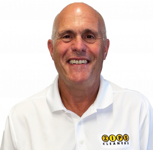 an image of a man in white polo shirt