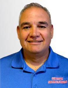 Jesse Flores, owner of Superior Solar Cleaners in Visalia, California, specializing in residential solar panel cleaning and maintenance.