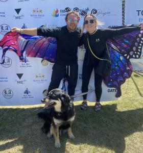 Ryan McCartney and his partner Jessica McGannon with their dog Charley, all dressed as butterflies during The Grand Butterfly Gathering in Jackson, WY, in June 2025.  Photo: Ryan McCartney/Jessica McGannon.