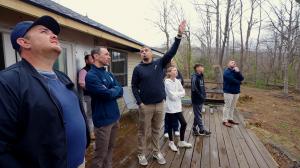 group surveying damage caused by hurricane helene before paint it forward project in charlotte, nc