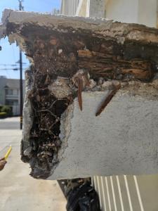Discovering hidden rot in apartment and condo balconies. Malki Construction repairs the deficits.