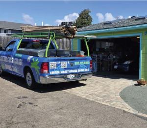 Branded Central Coast Garage Doors 24/7 service truck parked and equipped for emergency garage door repair, spring replacement, and opener service in San Luis Obispo County, California.