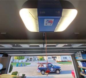 residential garage door opener, securing the motor unit and rail system for safe and efficient performance in San Luis Obispo County, California.