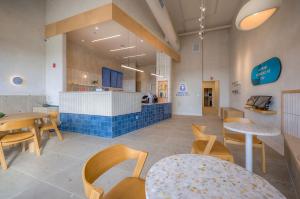 Feng Cha, the premium bubble tea and boba-infused beverage brand, has unveiled a new store prototype that reflects the company’s continued evolution toward a more elevated, design-forward café experience Feng Cha Store - Inside