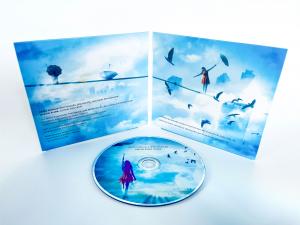 CD and package, bright white and blue sky with girl floating and scattered blackbirds
