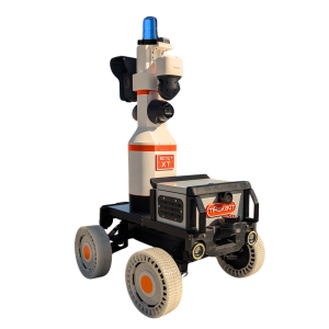 Side view of TASKBOT™ SCOUT XT, a rugged four-wheel autonomous outdoor patrol robot with mounted cameras and blue beacon light.
