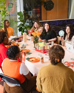 Creative Repute team members engaged in a strategic discussion during a client session.