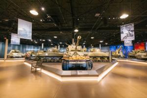 Tanks inside a museum gallery.