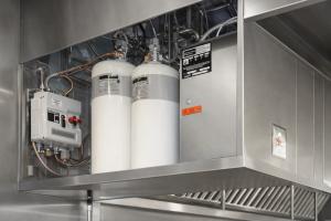 In a city where skyscrapers meet curbside diners, commercial cooking is on the rise and industry experts say our fire safety codes are stuck in the past A fire suppersion installed on a restaurant hood at a local NYC eatery