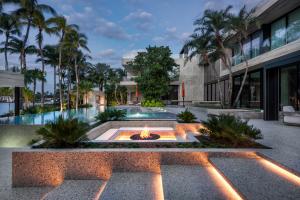 fire pit, steps, pool, walls clad in terrazzo