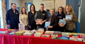 Suburban Pest Control delivered 117 children's books to the Junior League of Central Westchester to distribute through the Head Start Program.