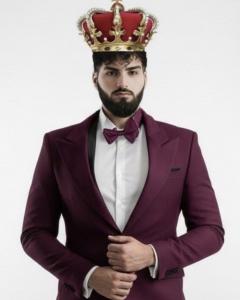 Vegan King, a popular TikTok creator known for his debates and advocacy for animal rights, showcases his signature style with a crown, symbolizing his leadership in the vegan community.