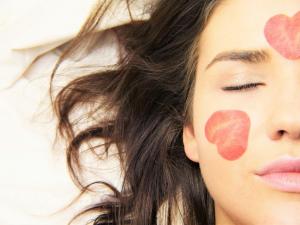 Close-up of a beautiful woman's half-face, representing confidence and self-care at YouShine Medspa.
