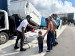 JUNK.COM EXTENDS ITS SERVICE BEYOND THE CURB AT THE WOODLANDS TOUCH-A-TRUCK