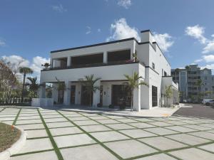 Exterior view of the John R. Wood Christie’s International Real Estate office at 6875 Estero Blvd. on Fort Myers Beach.
