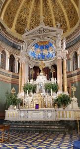 Photo of the inside of the National Landmark church's beautiful sanctuary at Église St-Jean-Baptiste at 184 E. 76th Street at Lexington Ave.