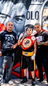 Loke G and Brickaveli from KBT with Daniel Olavarrieta of MBC Mena's Boxing Club wearing his Trophy Belt awarded from first Annual Quiroga Boxfest.